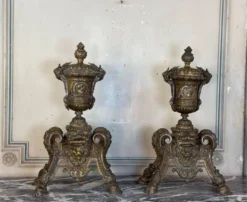 Paire de chenets de style Louis XIV en bronze d’après un dessin de André-Charles Boulle