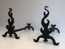Paire de chenets en fonte et fer forgé