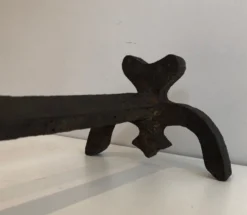 Paire de chenets en fonte et fer forgé