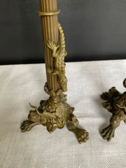 Paire de flambeaux XIXe en bronze doré style empire