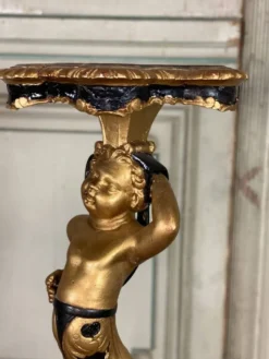 Paire de sellettes en bois sculpté, patine noire et dorée vers 1900