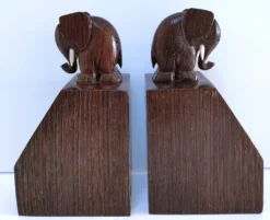 Paire de serre-livres éléphants stylisés bois massif