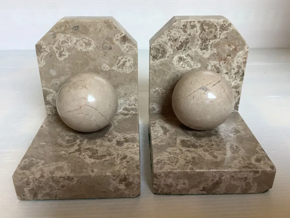 Paire de serres livres boules en marbre beige