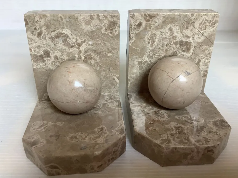 Paire de serres livres boules en marbre beige