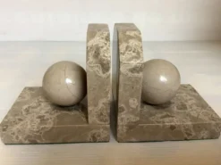 Paire de serres livres boules en marbre beige