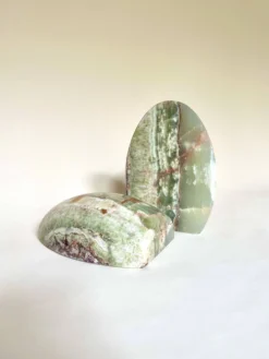 Paire de serres-livres "oeuf" en onyx vert
