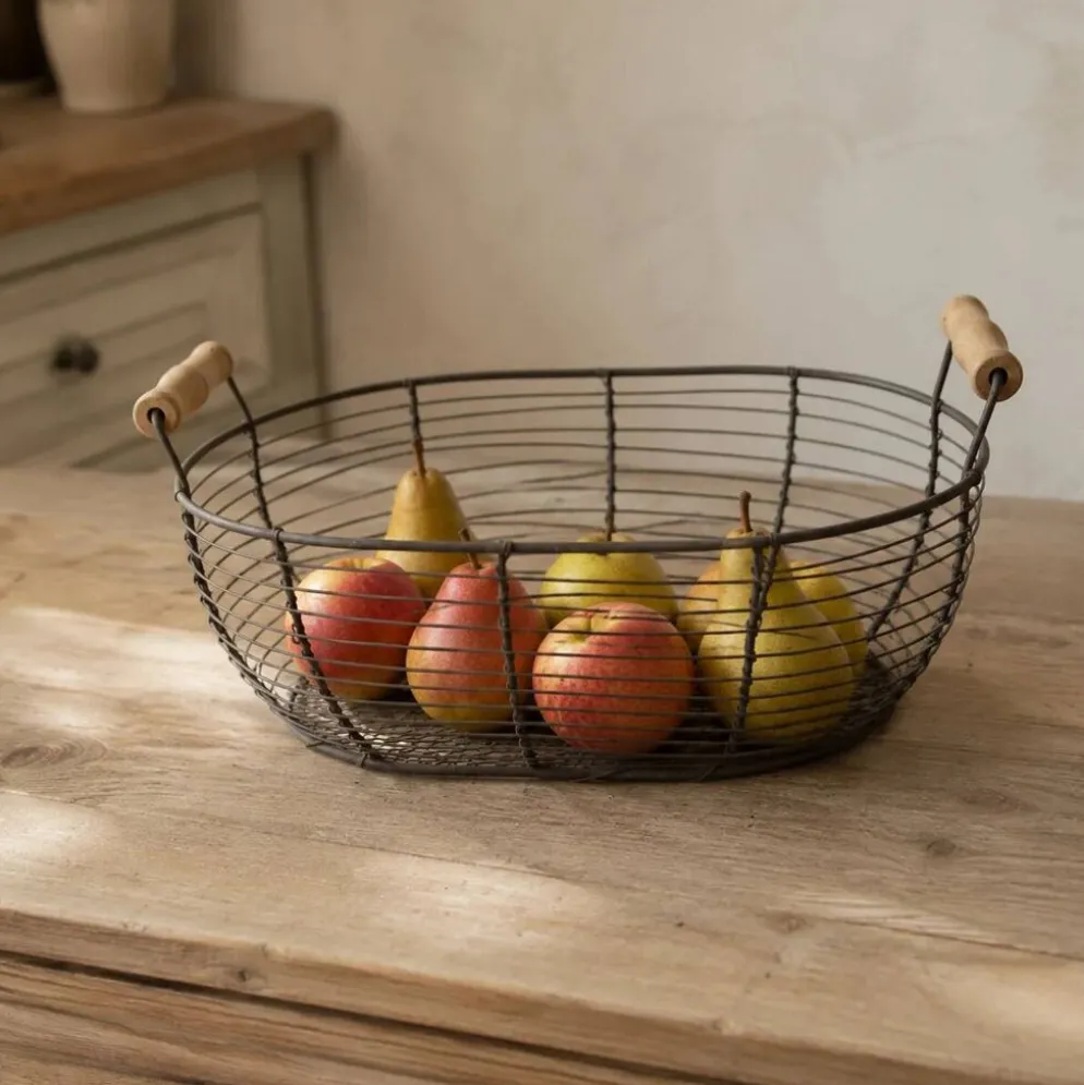 Panier ovale en métal grillagé avec poignées en bois