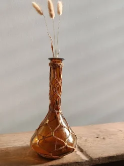 Petite dame-jeanne vintage en verre ambré et fibres tressées