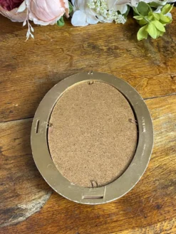 Petit miroir de forme ovale italien