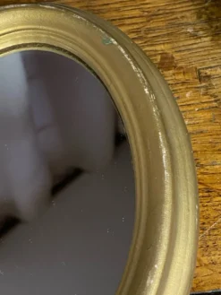 Petit miroir de forme ovale italien