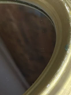 Petit miroir de forme ovale italien