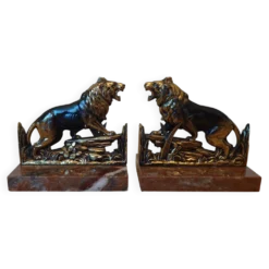 Petits serre-livres lions rugissants en régule patiné sur socle en marbre