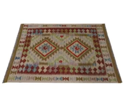 Petit tapis en laine tissé à plat avec un motif géométrique en zigzag pour le salon.