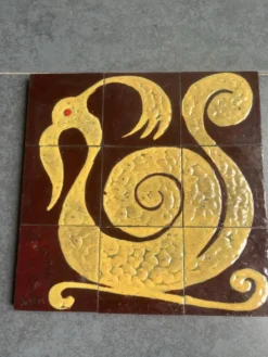 Plaque de céramique motif zoomorphe composée de 9 carreaux