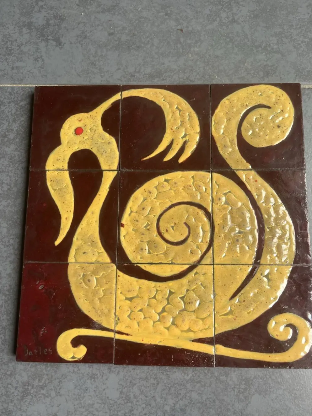 Plaque de céramique motif zoomorphe composée de 9 carreaux