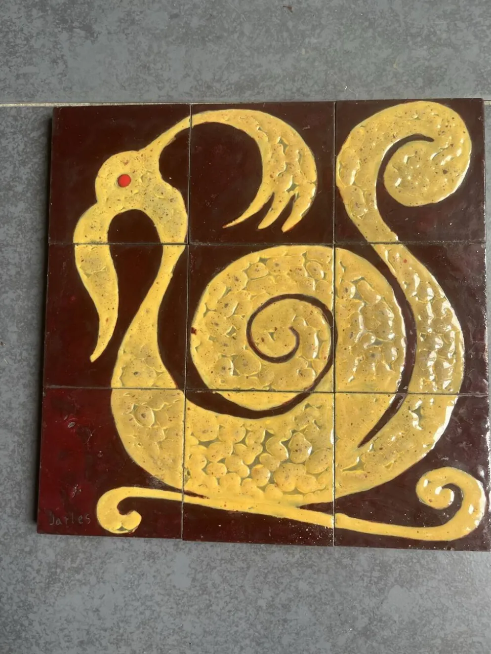 Plaque de céramique motif zoomorphe composée de 9 carreaux