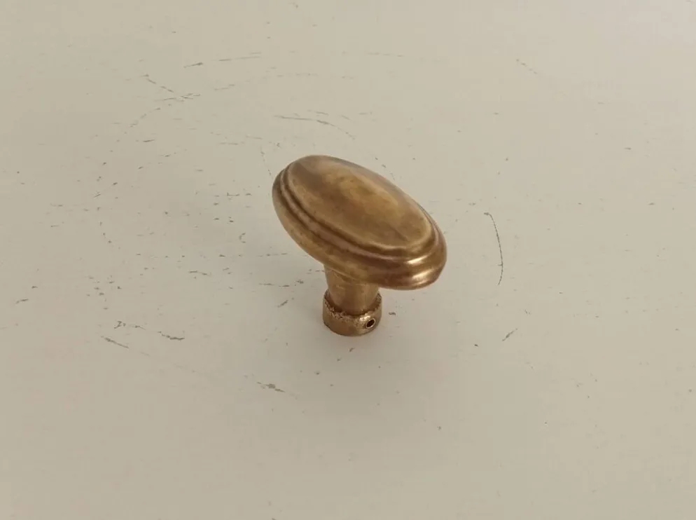 Poignée de porte ancienne en laiton massif doré