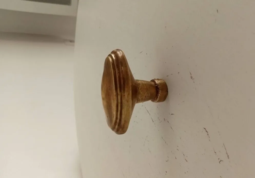 Poignée de porte ancienne en laiton massif doré