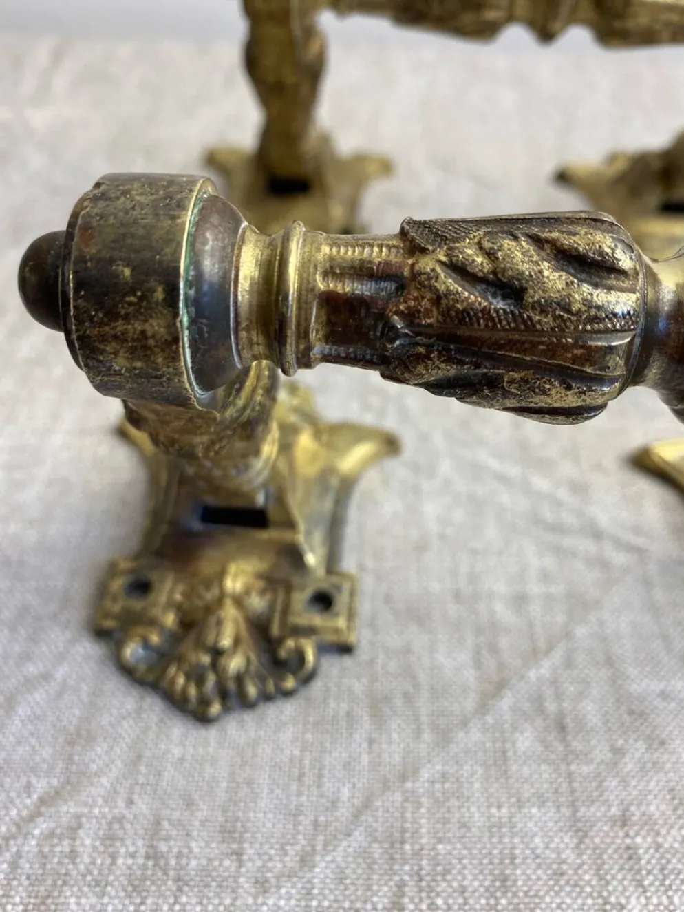 Poignées articulées en bronze