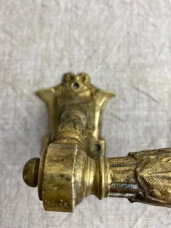 Poignées articulées en bronze