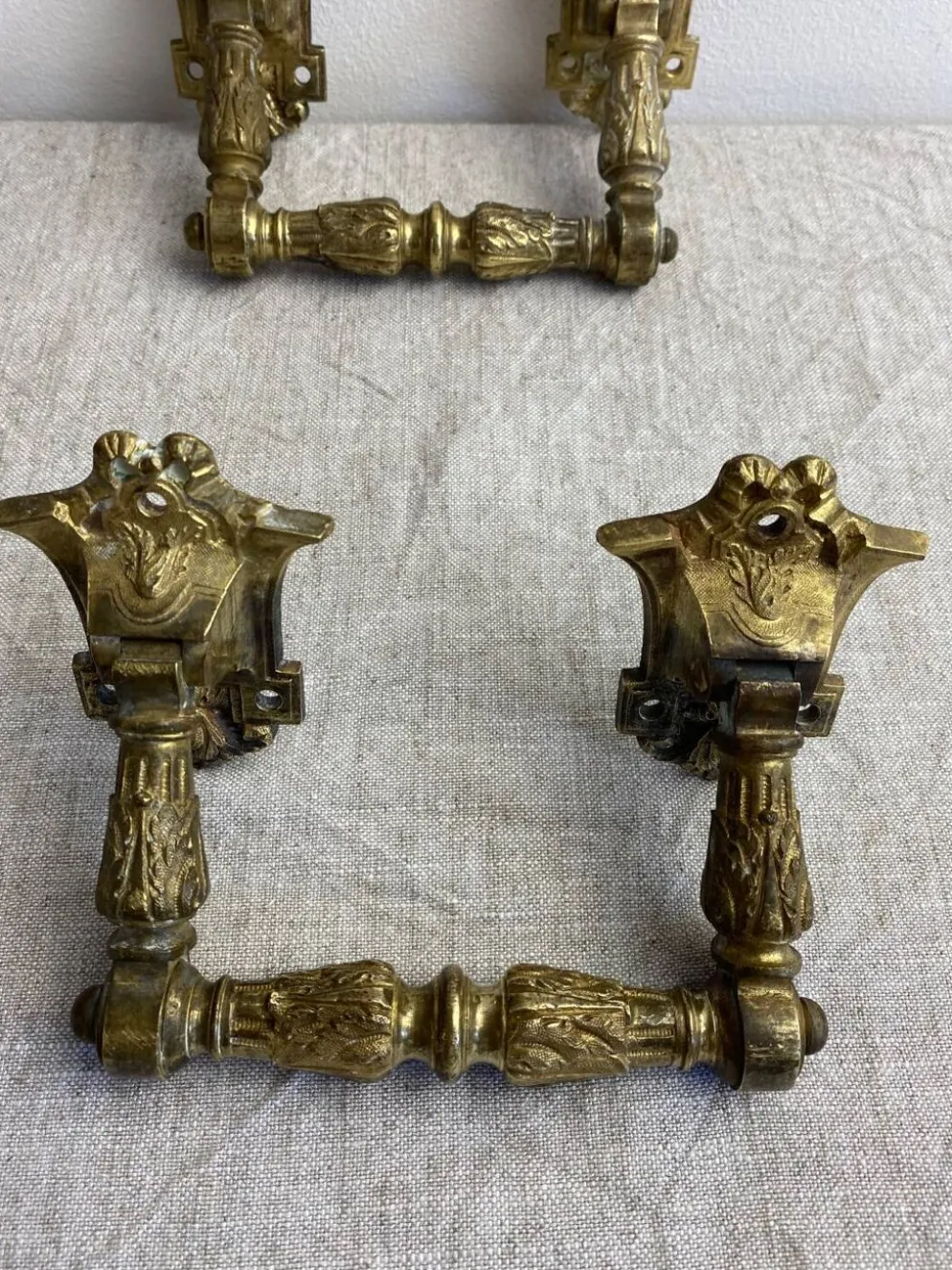 Poignées articulées en bronze
