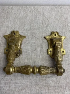 Poignées articulées en bronze