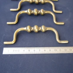 5 poignées en metal aspect bronze