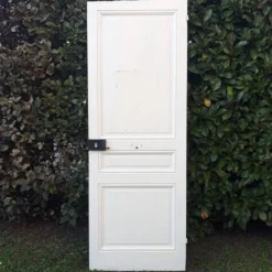 Porte de communication ancienne panneautée et moulurée