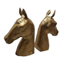Porte-livres en laiton des années 50 en forme de têtes de cheval