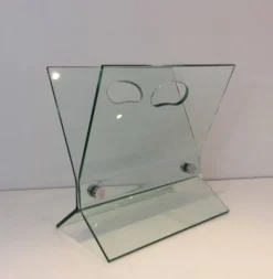 Porte-revues design en verre et acier brossé