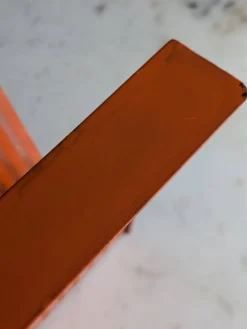 Porte revues vintage en métal perforé orange/Style Mathieu Mategot/70'