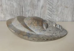 Sculpture visage africain en pierre
