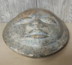 Sculpture visage africain en pierre