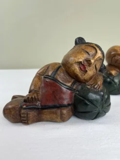 Serre livres en bois sculpté