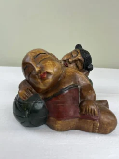 Serre livres en bois sculpté