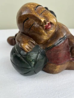 Serre livres en bois sculpté