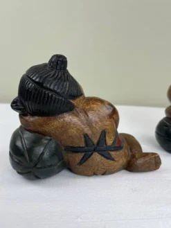 Serre livres en bois sculpté