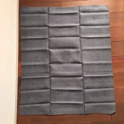 Serviette de table ancienne brodée MA gris foncé