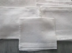 7 serviettes de table anciennes damassées - dépareillées