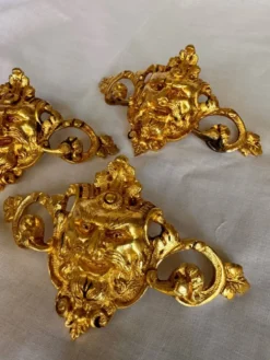 Set de 3 éléments décoratifs en bronze/laiton.
