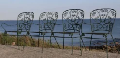 Série de 4 fauteuils de jardin en fer forgé, France, XXe siècle