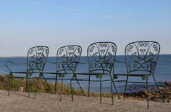 Série de 4 fauteuils de jardin en fer forgé, France, XXe siècle
