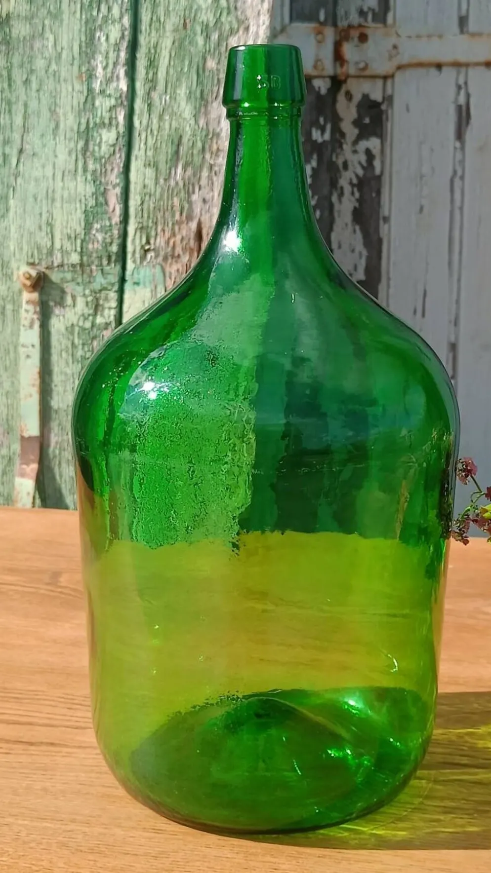 Superbe dame jeanne ancienne en verre vert
