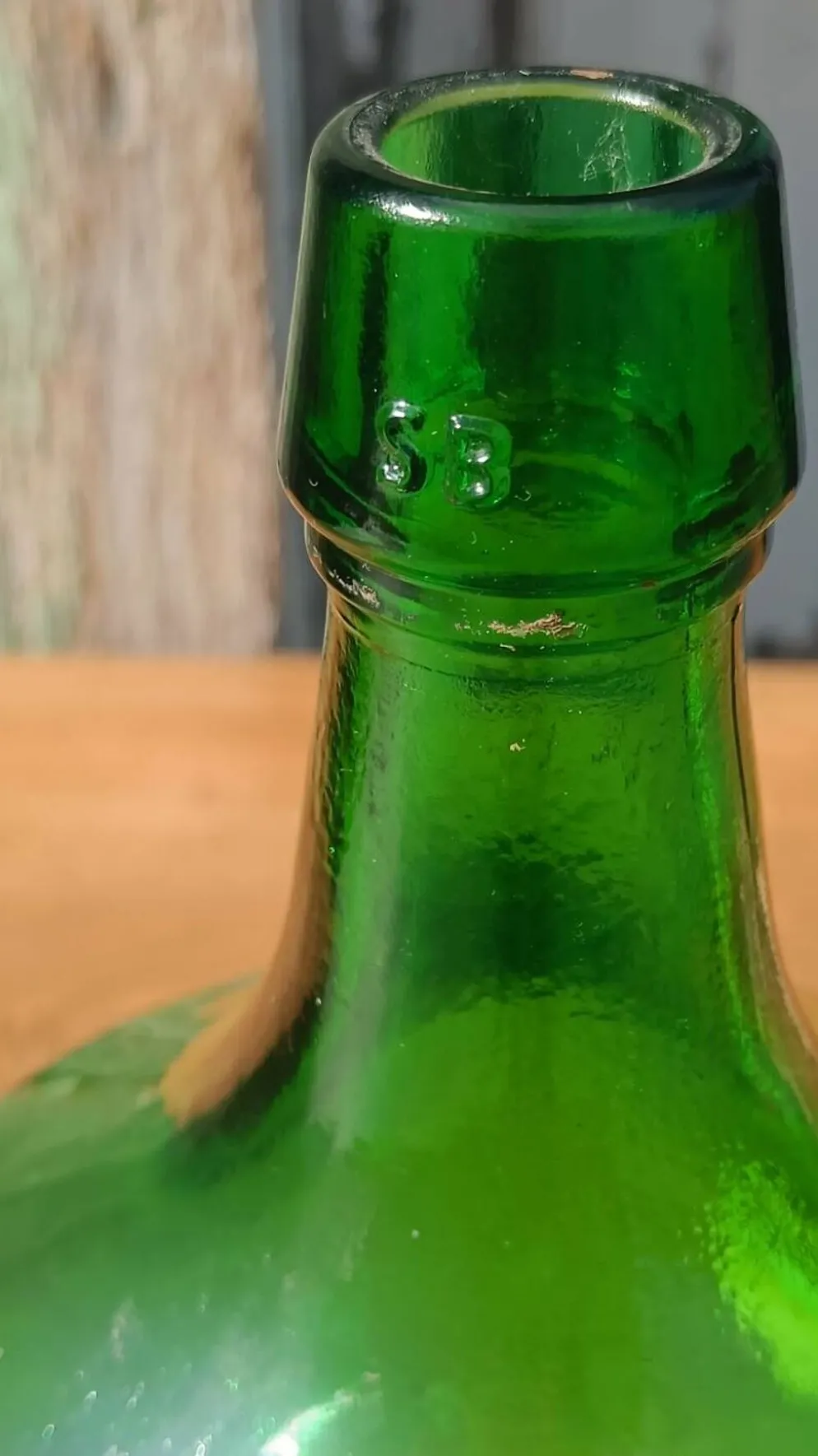 Superbe dame jeanne ancienne en verre vert