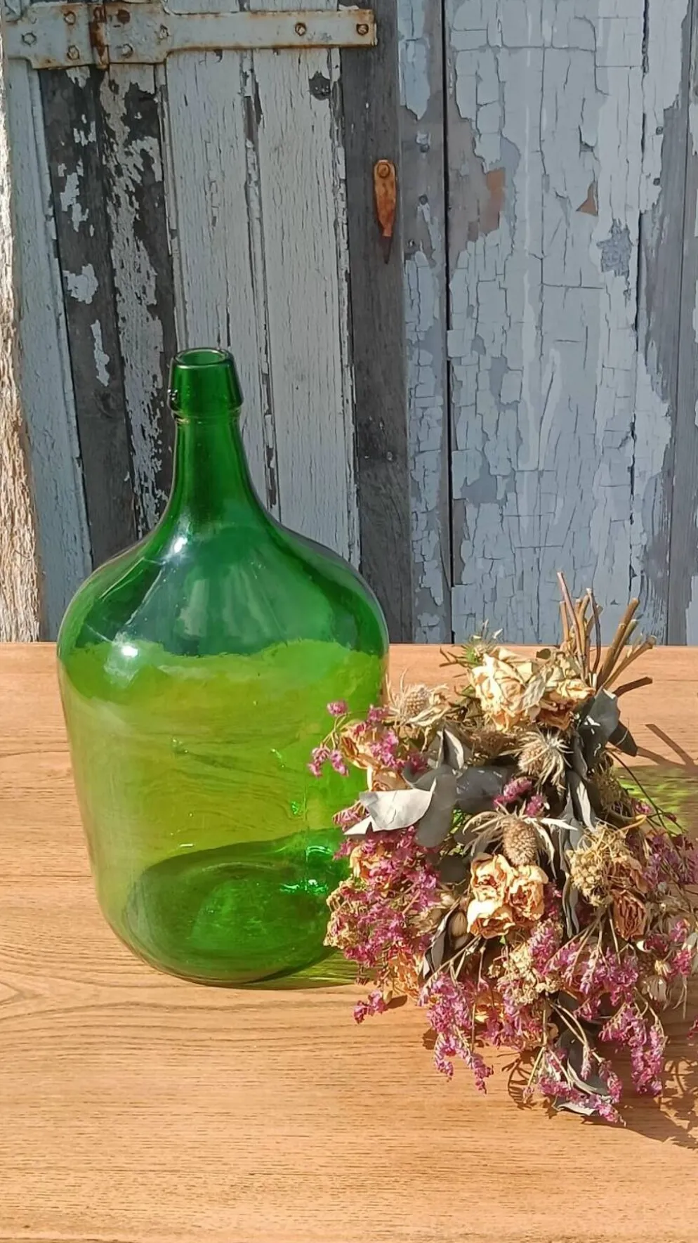 Superbe dame jeanne ancienne en verre vert