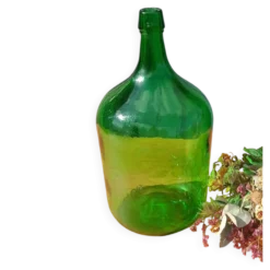 Superbe dame jeanne ancienne en verre vert