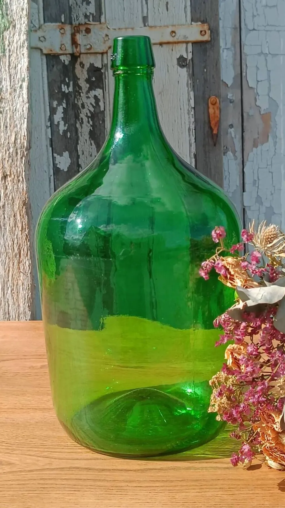 Superbe dame jeanne ancienne en verre vert