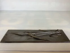 Tableau en métal oiseau zoomorphe