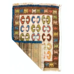 Tapis d'accent turc Tulu vintage unique en son genre, noué à la main, avec des motifs géométriques colorés, 100 % laine.
