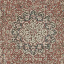 Tapis d'aire turc rouge vintage pour la décoration du salon. Tapis en laine noué à la main avec un design de médaillon.